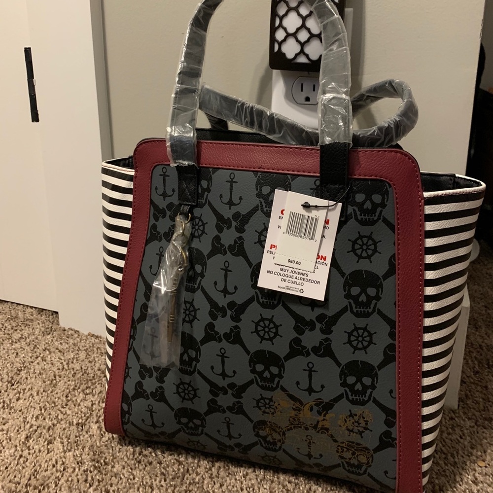 NWT Disney Parks Pirates of the Caribbean Handbag